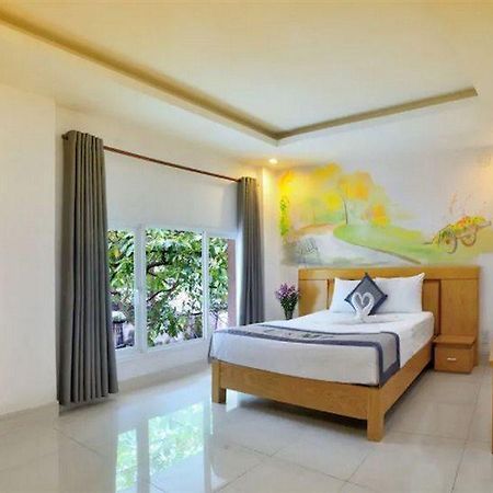 U And Me Hotel Tan Phong ภายนอก รูปภาพ